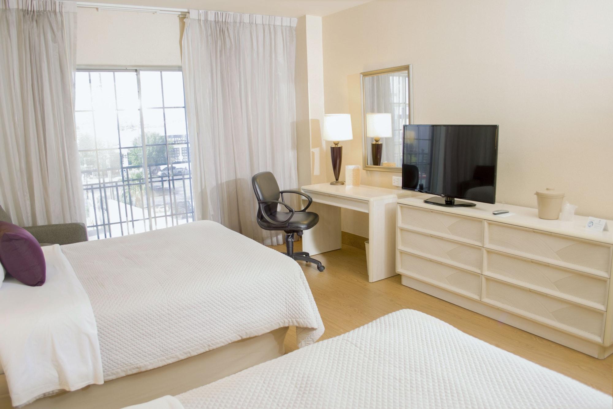 Istay Hotel Сиудад Хуарес Екстериор снимка A typical bedroom at a Residence Inn